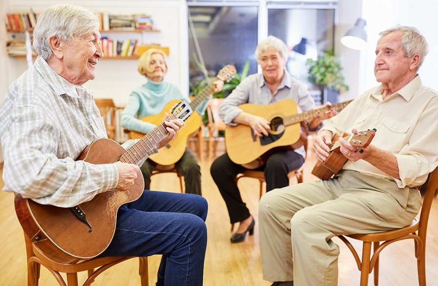 A group seniors are playing music .