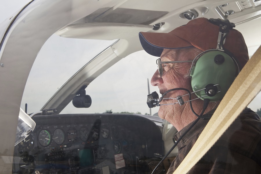 A senior pilot who is guiding the airplane