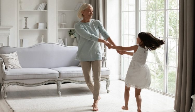 grandmother dances with he granddaughter