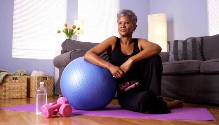 senior woman practices aerobics