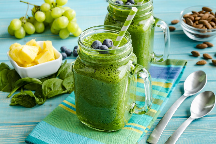 a glass of green smoothie