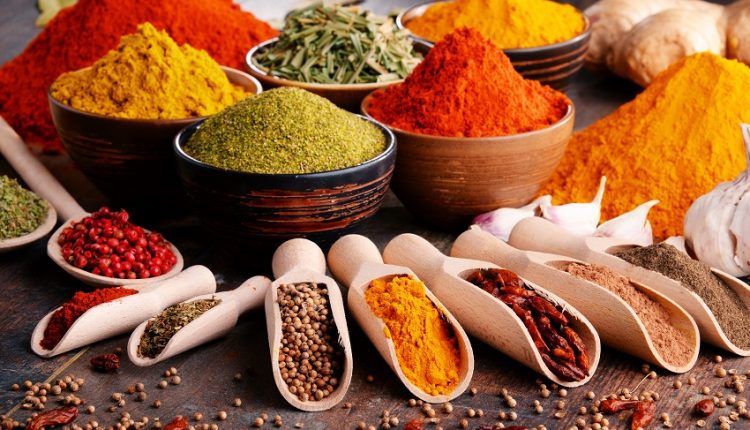Some spices on a wooden table to strengthen the immune system