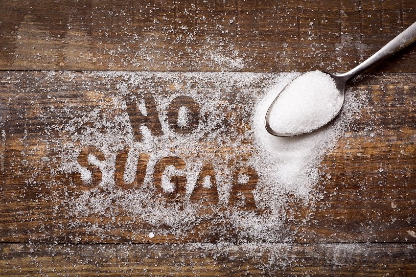 Words no sugar written with sprinkled sugar