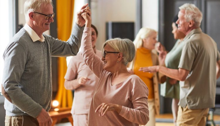 Happy seniors learning how to dance