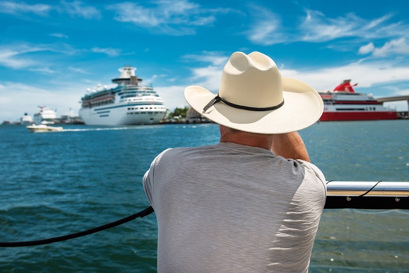 A senior man going back to cruise ship after island tour