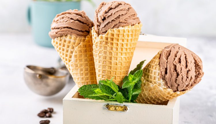 3 cones of lactose free chocolate ice cream in a white box