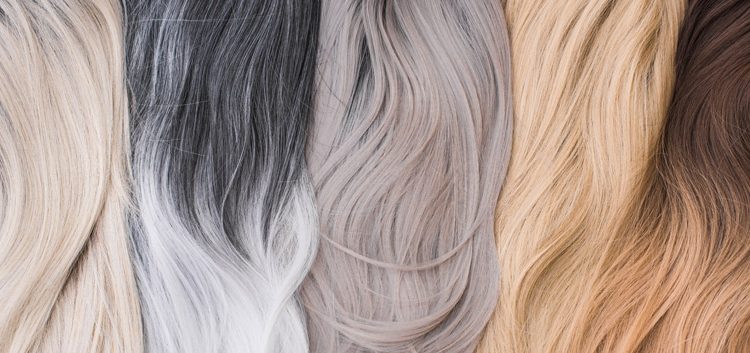 Close up view of wigs in different colours 