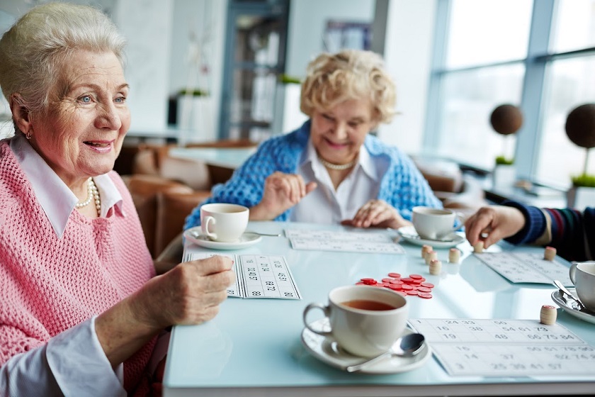 Three senior ladies playing Bingo