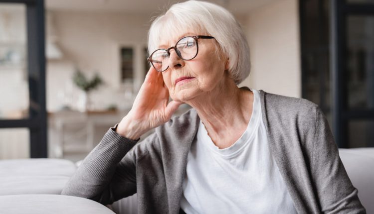 Senior woman looking depressed and sad