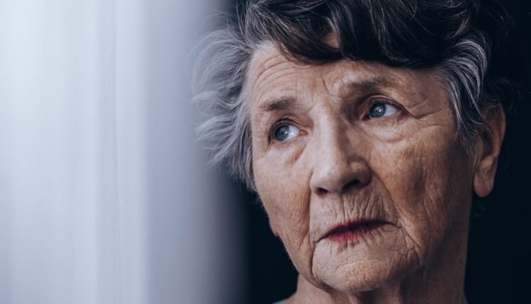 Portrait of a senior woman with dementia