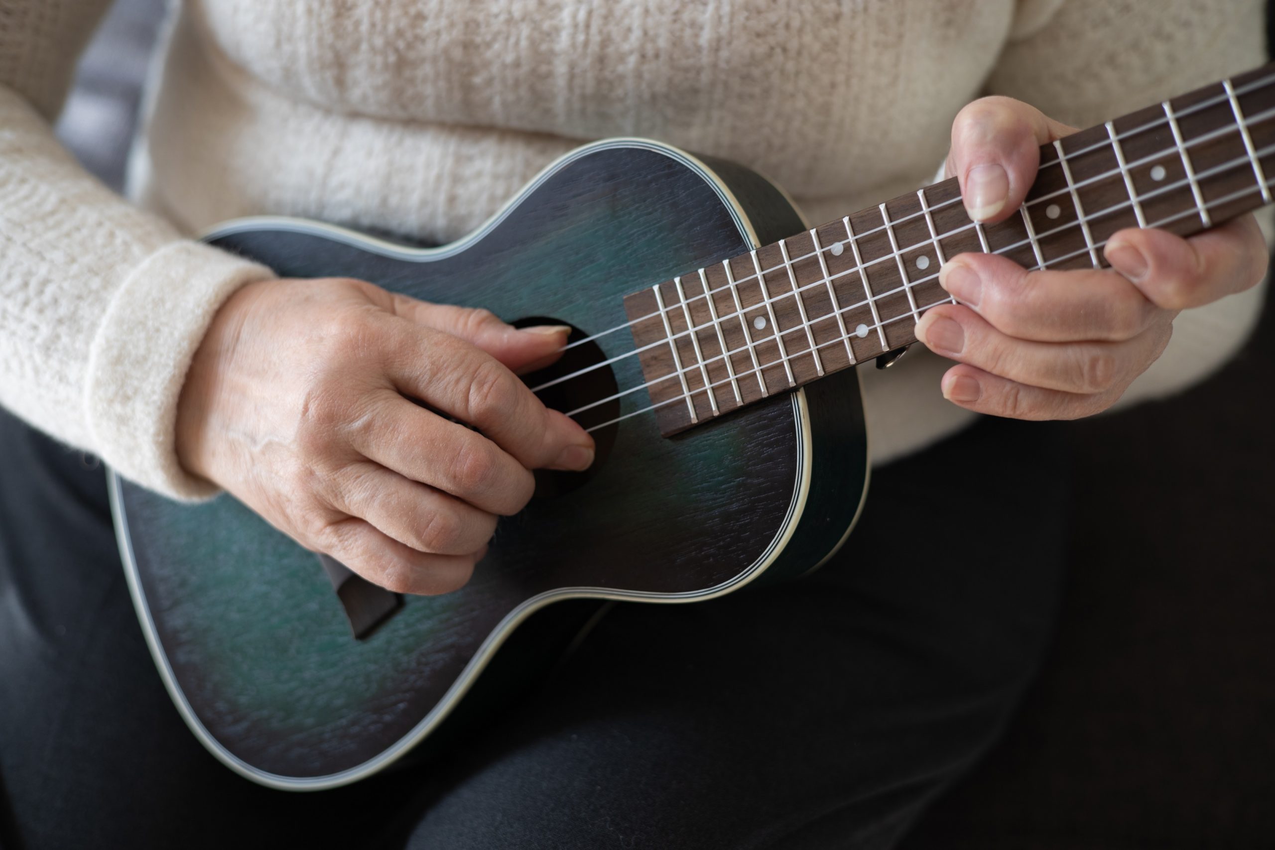 Senior woman playing instrument