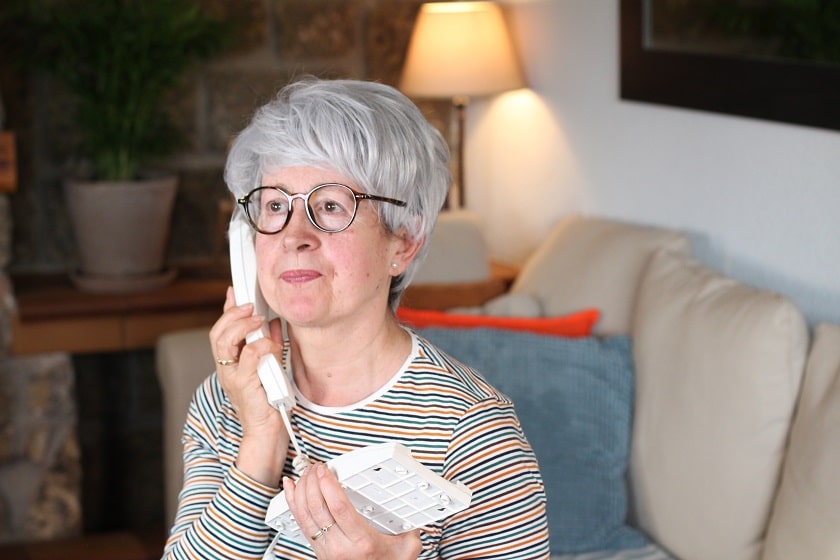 a senior with dementia, using her home phone