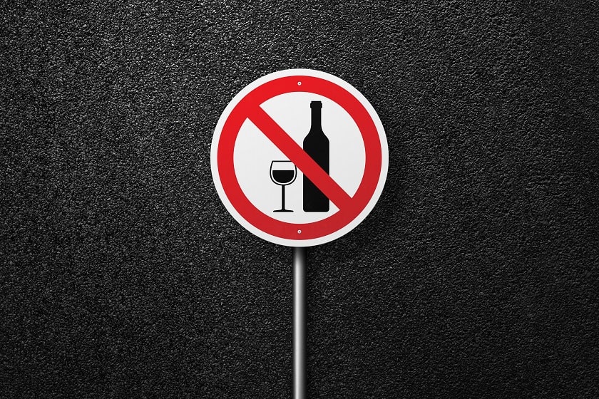 "stop drinking alcohol" road sign