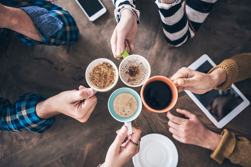 People drinking coffee in a café