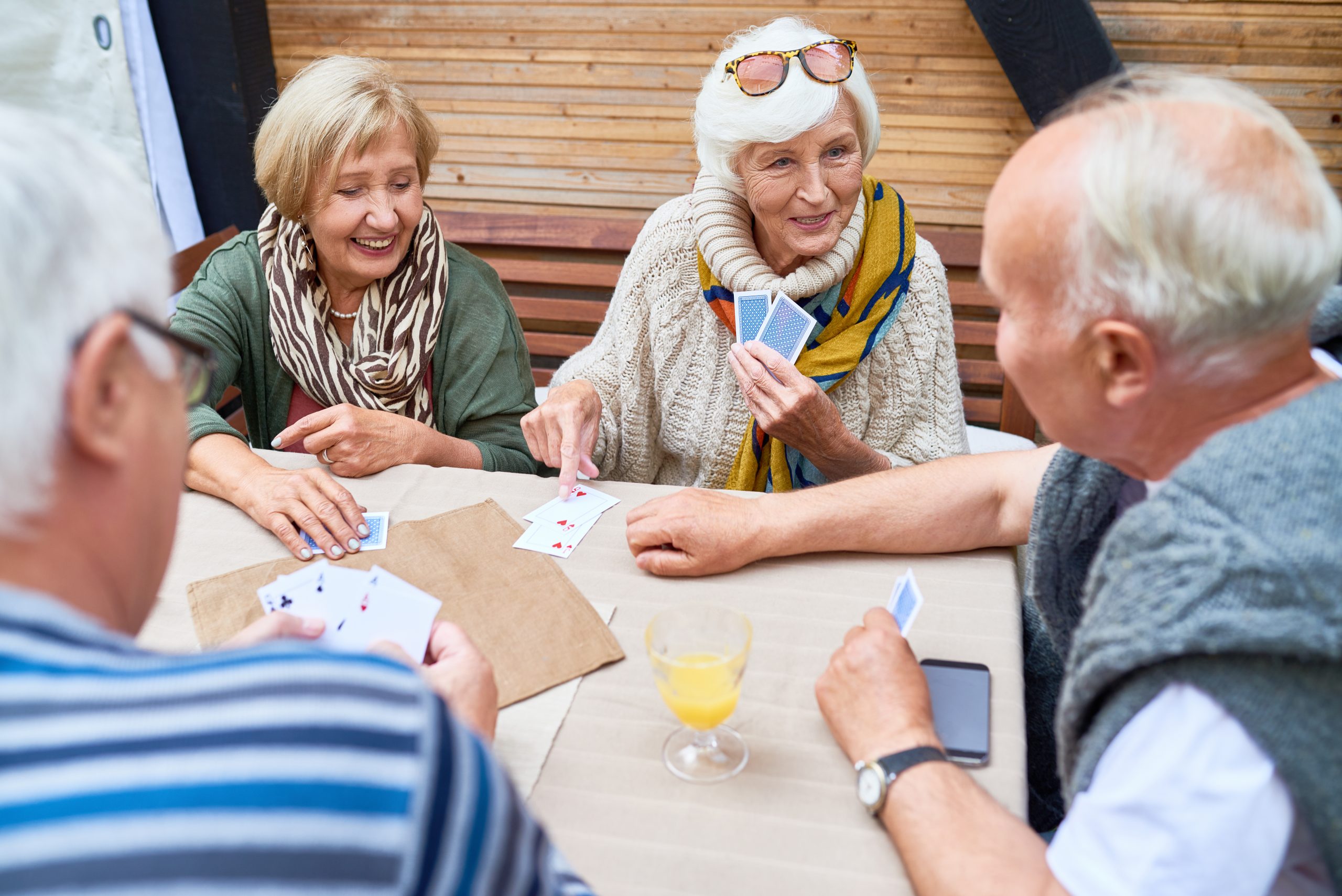 Happy Seniors Playing Cards 