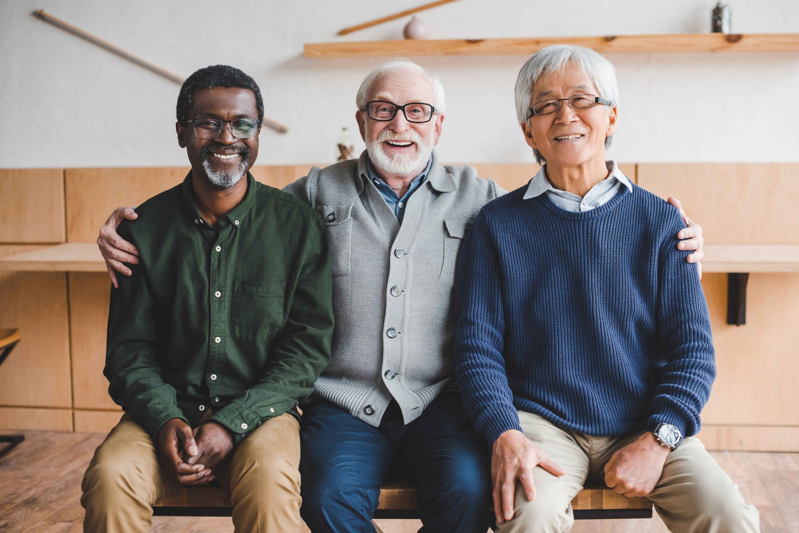 Three Senior Men Smiling to the Camera