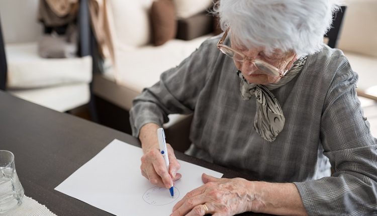 Alzheimer's test Alzheimer's app High,Angle,View,Of,A,Senior,Caucasian,Woman,Doing,Alzheimer's